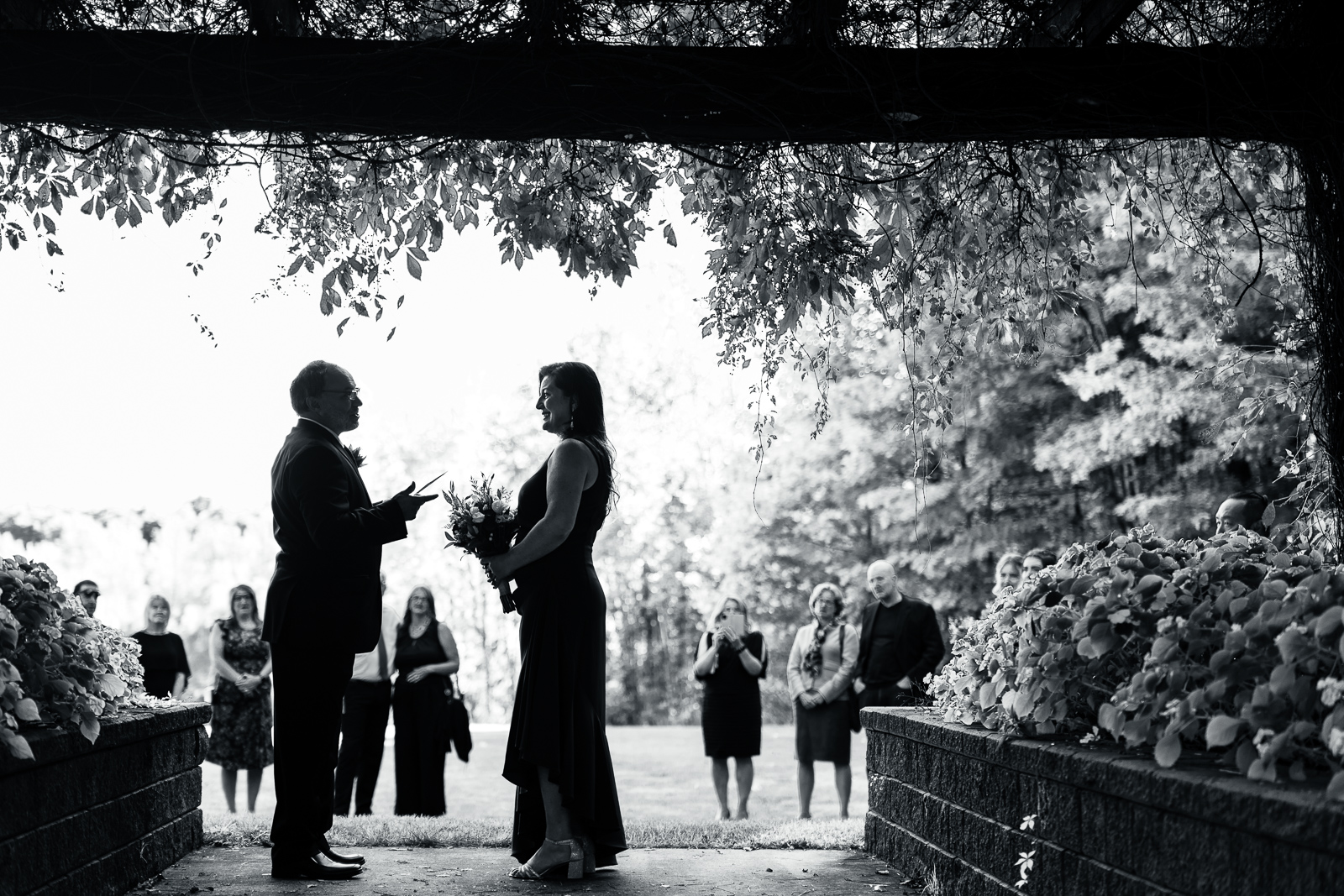 Bride and groom during vows by Ottawa Wedding Photographer Sara